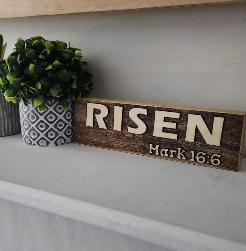 Risen Shelf Sign Image